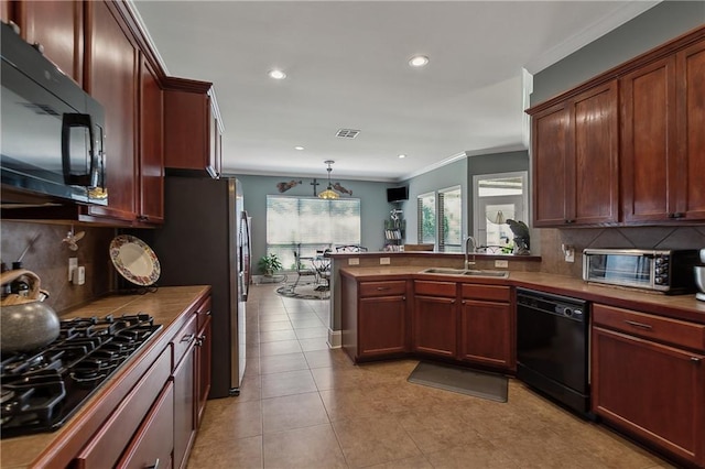 11446 Copperwood Dr, Denham Springs, LA 70726 - kitchen with black appliances, a sink, crown molding, a peninsula, and tasteful backsplash