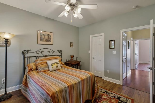 11446 Copperwood Dr, Denham Springs, LA 70726 - bedroom with baseboards, wood finished floors, and a ceiling fan