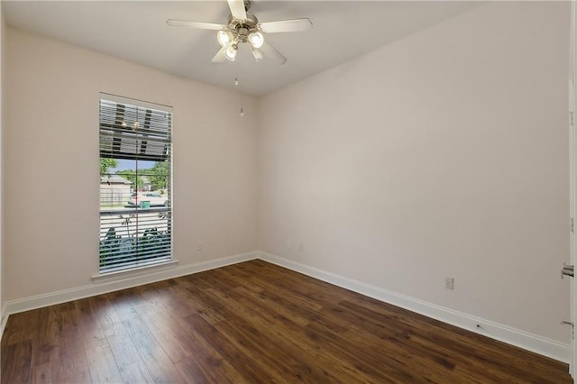 11446 Copperwood Dr, Denham Springs, LA 70726 - unfurnished room featuring baseboards, dark wood-style floors, and a ceiling fan