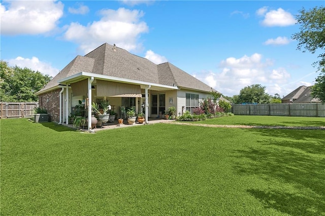 11446 Copperwood Dr, Denham Springs, LA 70726 - rear view of property with a patio area and a shingled roof