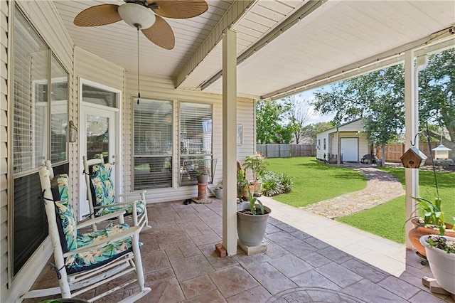 11446 Copperwood Dr, Denham Springs, LA 70726 - view of patio featuring a ceiling fan and an outdoor structure