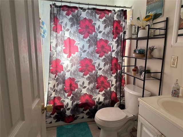 441315 Herrmann St, Metairie, LA 70006 - full bathroom featuring toilet, curtained shower, vanity, and tile patterned floors
