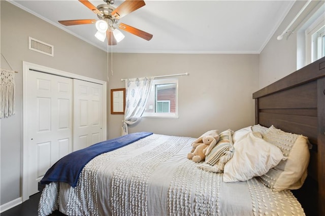 33 Caribou Ct, Metairie, LA 70003 - bedroom with crown molding, a closet, and a ceiling fan