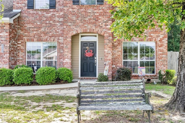 682 Amy Ct, Covington, LA 70433 - view of exterior entry featuring brick siding
