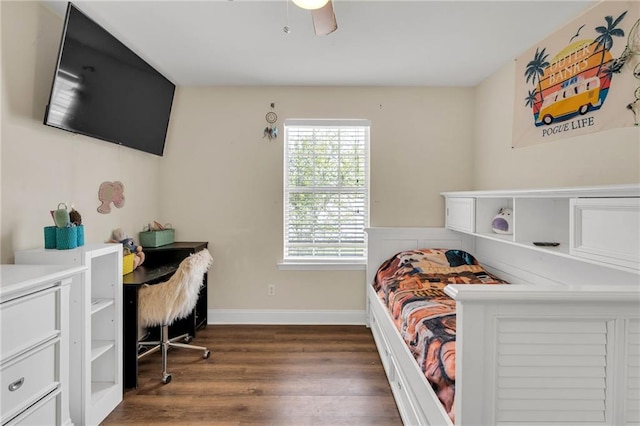 682 Amy Ct, Covington, LA 70433 - bedroom with dark wood-type flooring, baseboards, and a ceiling fan