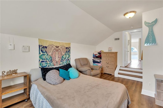 682 Amy Ct, Covington, LA 70433 - bedroom with wood finished floors and lofted ceiling