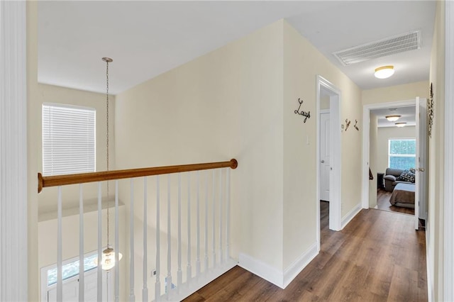 682 Amy Ct, Covington, LA 70433 - corridor featuring dark wood-type flooring and baseboards