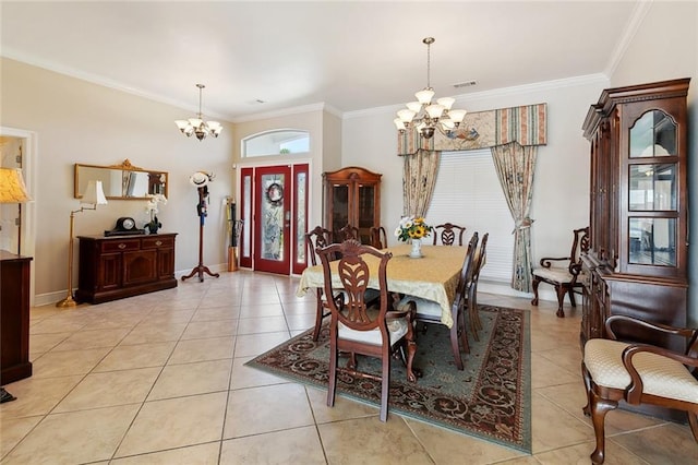 1681 Vela Cv, Slidell, LA 70458 - dining space featuring a chandelier, ornamental molding, light tile patterned flooring, and baseboards