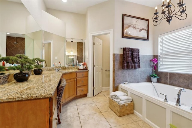 1681 Vela Cv, Slidell, LA 70458 - bathroom featuring a bath, vanity, tile patterned flooring, and a chandelier