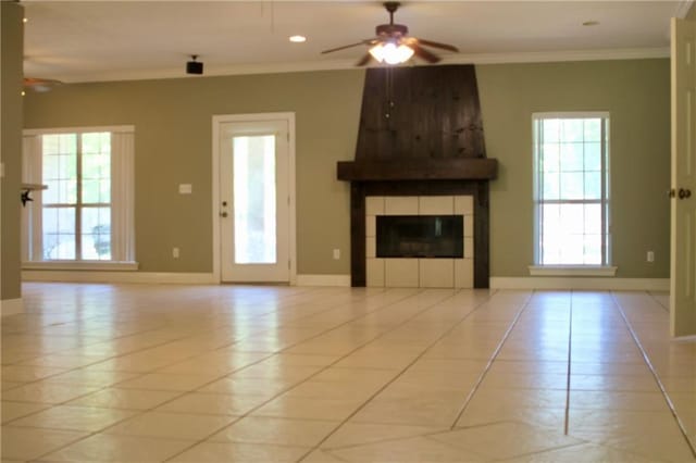 66165 Hickory Dr, Pearl River, LA 70452 - unfurnished living room featuring ceiling fan, light tile patterned floors, baseboards, and ornamental molding