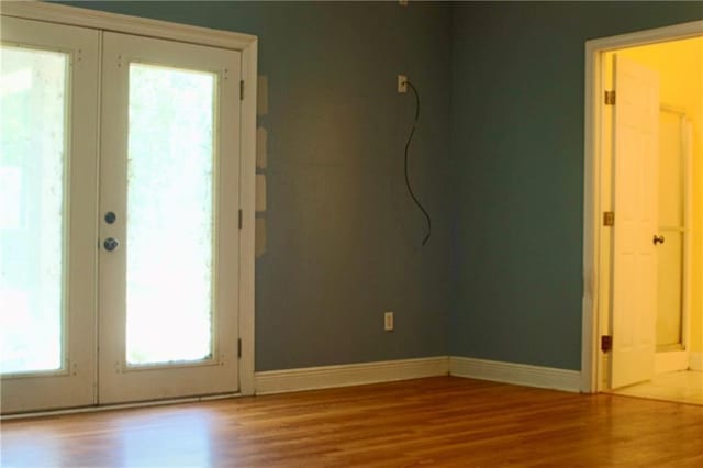66165 Hickory Dr, Pearl River, LA 70452 - entryway with french doors, baseboards, and wood finished floors