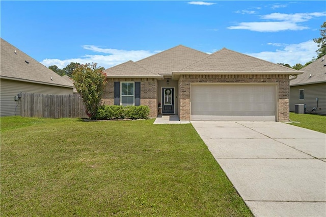 20413 Palm Blvd, Covington, LA 70435 - view of front facade featuring brick siding, an attached garage, concrete driveway, and central AC