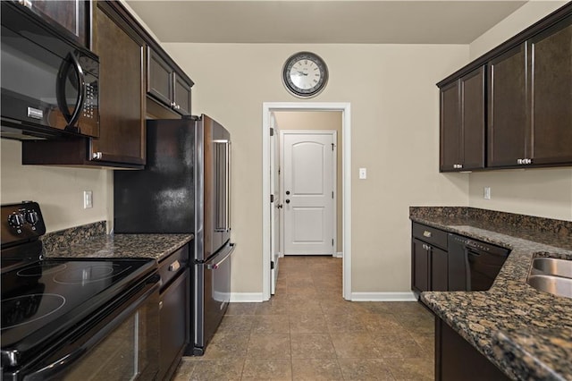 20413 Palm Blvd, Covington, LA 70435 - kitchen featuring black appliances, baseboards, dark brown cabinetry, and dark stone countertops