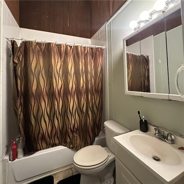937-939 N Claiborne Ave, New Orleans, LA 70116 - bathroom featuring shower / bath combination with curtain, toilet, and vanity