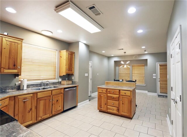 47013 Rivergate Dr, Robert, LA 70455 - kitchen with dishwasher, a sink, baseboards, recessed lighting, and light tile patterned floors