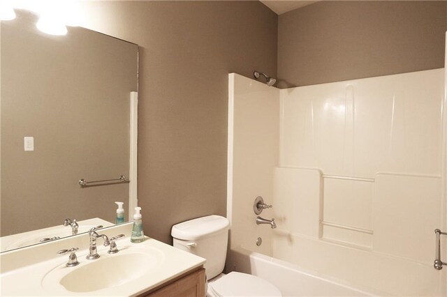 47013 Rivergate Dr, Robert, LA 70455 - full bathroom featuring toilet, vanity, and tub / shower combination