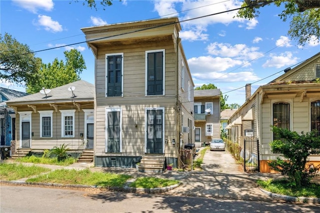 1915-1917 Bayou Rd, New Orleans, LA 70116 - view of front of house with entry steps and fence