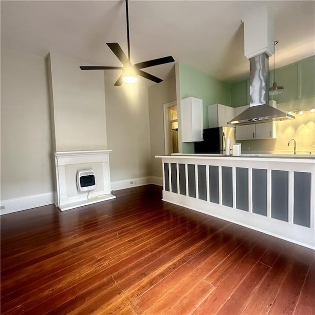 1915-1917 Bayou Rd, New Orleans, LA 70116 - unfurnished living room with a ceiling fan, hardwood / wood-style floors, and baseboards