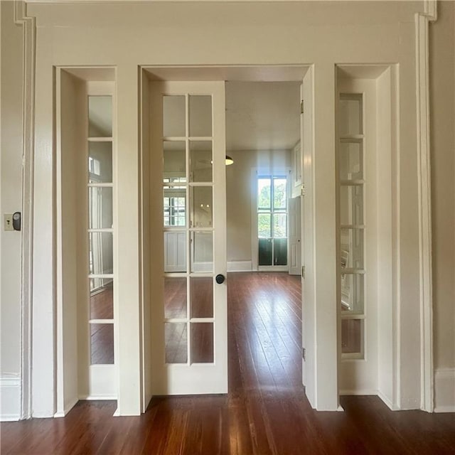 1915-1917 Bayou Rd, New Orleans, LA 70116 - entryway with hardwood / wood-style flooring and baseboards