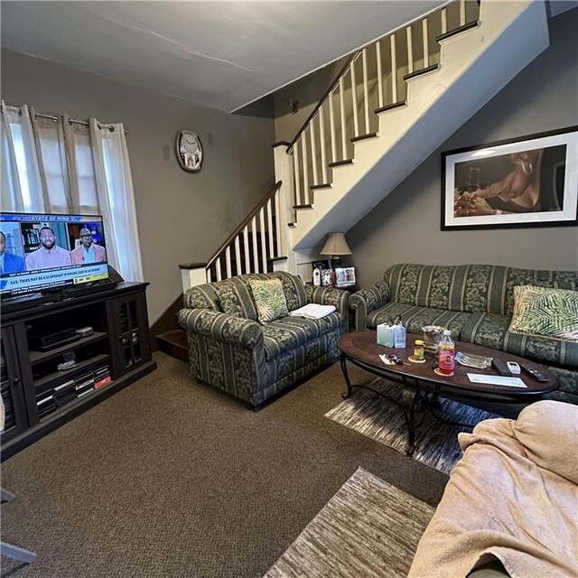 1915-1917 Bayou Rd, New Orleans, LA 70116 - living area with carpet floors and stairway
