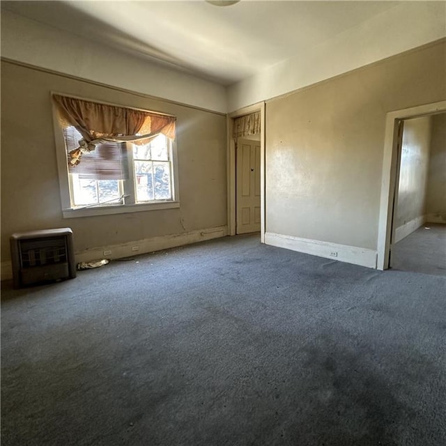 1915-1917 Bayou Rd, New Orleans, LA 70116 - unfurnished bedroom with carpet, a closet, and baseboards