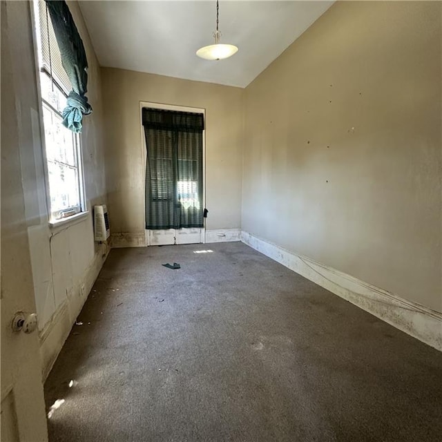 1915-1917 Bayou Rd, New Orleans, LA 70116 - unfurnished room featuring carpet floors and lofted ceiling