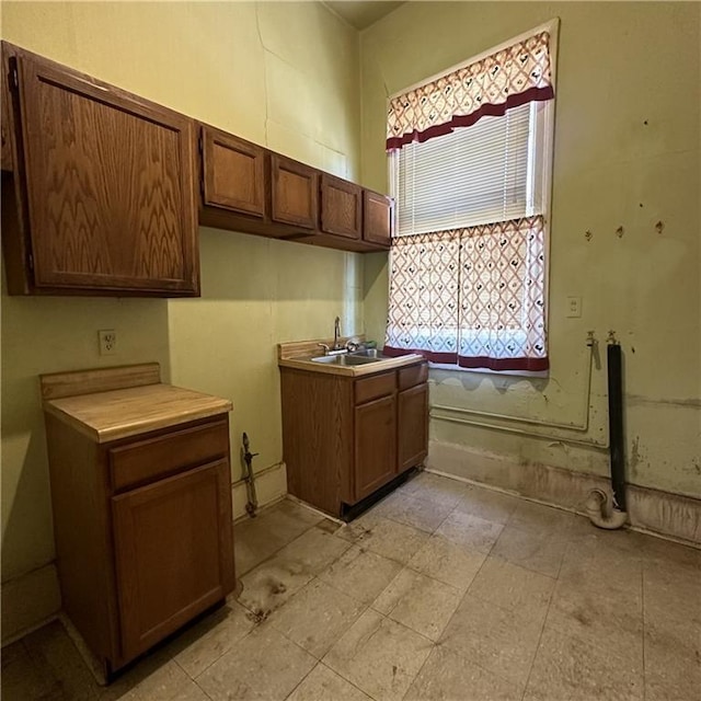 1915-1917 Bayou Rd, New Orleans, LA 70116 - kitchen with a sink and light countertops
