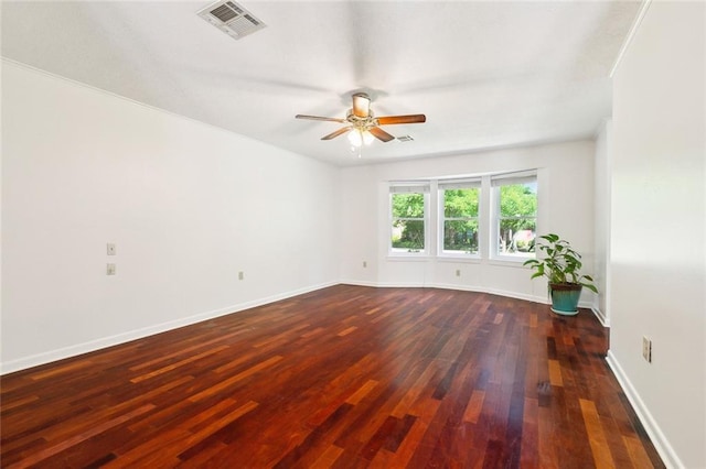 120 Pine Dr, Covington, LA 70433 - unfurnished room featuring ceiling fan, dark wood-style flooring, and baseboards