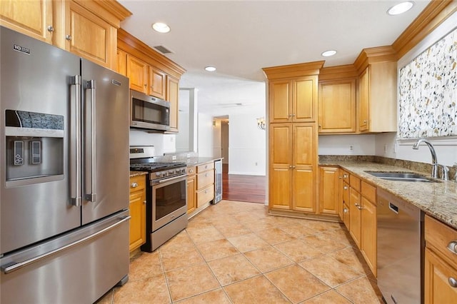 120 Pine Dr, Covington, LA 70433 - kitchen with stainless steel appliances, a sink, light stone counters, wine cooler, and recessed lighting