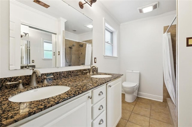 120 Pine Dr, Covington, LA 70433 - full bathroom featuring healthy amount of natural light, curtained shower, ornamental molding, toilet, and tile patterned flooring