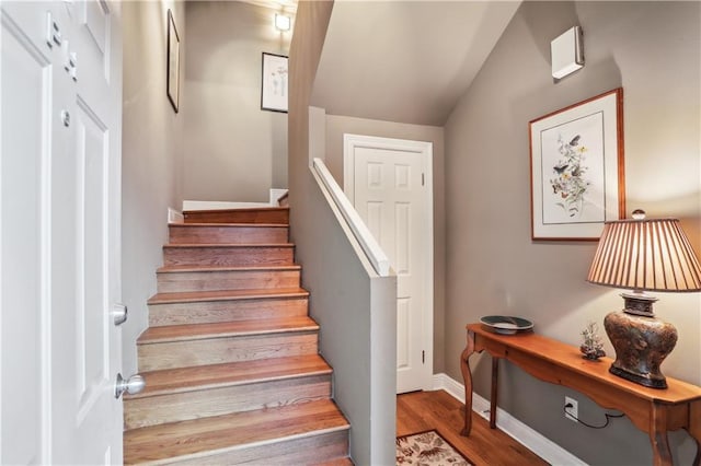 760 Magazine St Ph, Ph, New Orleans, LA 70130 - stairway with wood finished floors, baseboards, and lofted ceiling