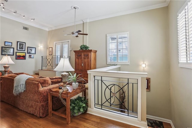 760 Magazine St Ph, Ph, New Orleans, LA 70130 - living room with wood finished floors, ornamental molding, a ceiling fan, rail lighting, and baseboards