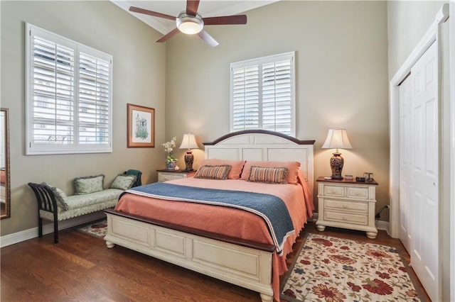 760 Magazine St Ph, Ph, New Orleans, LA 70130 - bedroom with multiple windows, dark wood-style flooring, a closet, and a ceiling fan