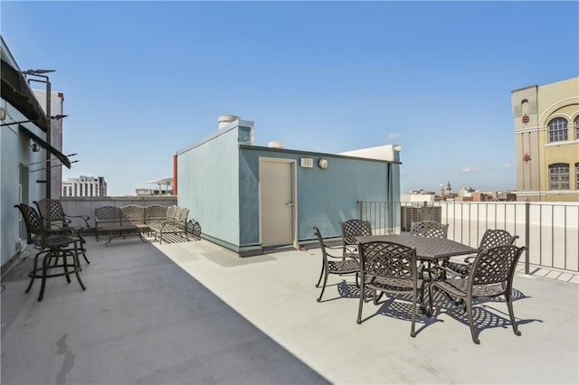 760 Magazine St Ph, Ph, New Orleans, LA 70130 - view of patio with outdoor dining area