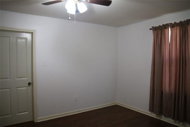 116 Southern Ct, Avondale, LA 70094 - spare room featuring a ceiling fan, dark wood-style flooring, and baseboards