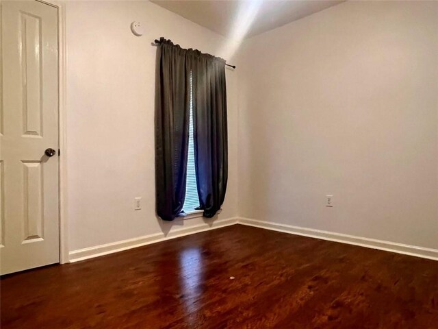 116 Southern Ct, Avondale, LA 70094 - empty room with baseboards and dark wood finished floors