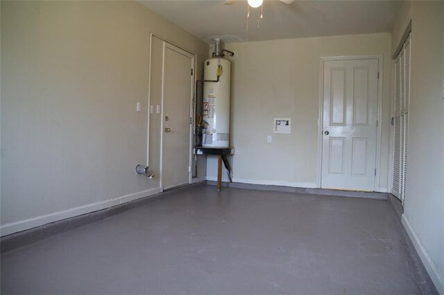 116 Southern Ct, Avondale, LA 70094 - garage featuring water heater, a ceiling fan, and baseboards