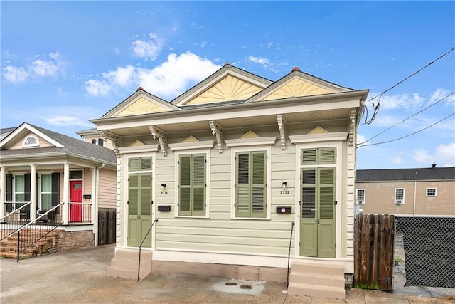 211315 S Liberty St, New Orleans, LA 70113 - shotgun-style home featuring entry steps
