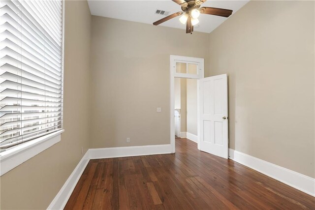211315 S Liberty St, New Orleans, LA 70113 - empty room featuring a ceiling fan, wood-type flooring, and baseboards
