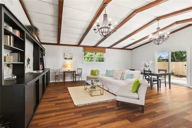 18 Davis Blvd, Jefferson, LA 70121 - living room featuring a chandelier, healthy amount of natural light, and dark wood-style flooring