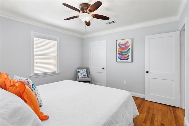 18 Davis Blvd, Jefferson, LA 70121 - bedroom with ornamental molding, hardwood / wood-style floors, and ceiling fan