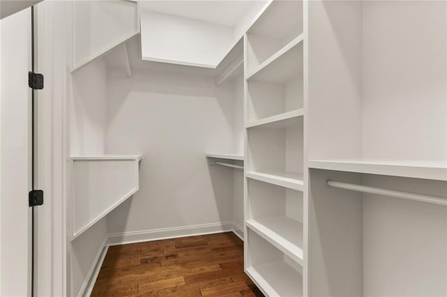 1109 David Dr, Metairie, LA 70003 - spacious closet featuring dark wood-type flooring