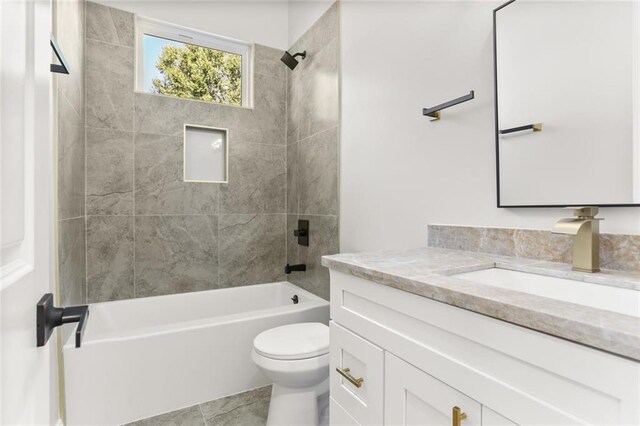 1109 David Dr, Metairie, LA 70003 - bathroom featuring toilet, tub / shower combination, and vanity