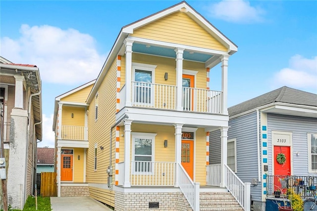 310507 Toulouse St, New Orleans, LA 70119 - view of front of house with covered porch and a balcony