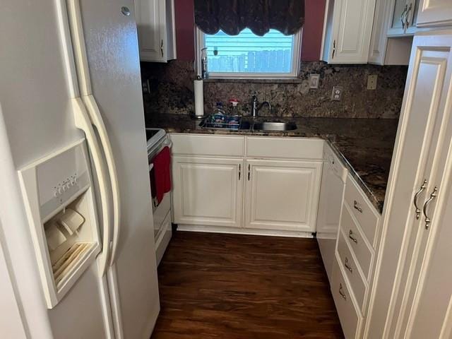 1329 Sigur Ave, Metairie, LA 70005 - kitchen with white refrigerator with ice dispenser, a sink, white cabinets, tasteful backsplash, and dark wood-style flooring