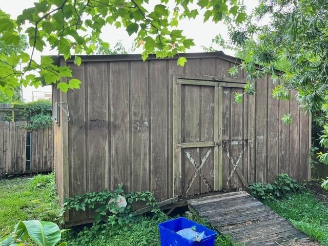 1329 Sigur Ave, Metairie, LA 70005 - view of shed with fence