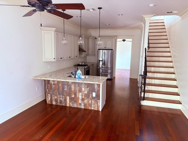 913 N Robertson St, New Orleans, LA 70116 - kitchen featuring appliances with stainless steel finishes, a ceiling fan, a peninsula, dark wood-style flooring, and ornamental molding
