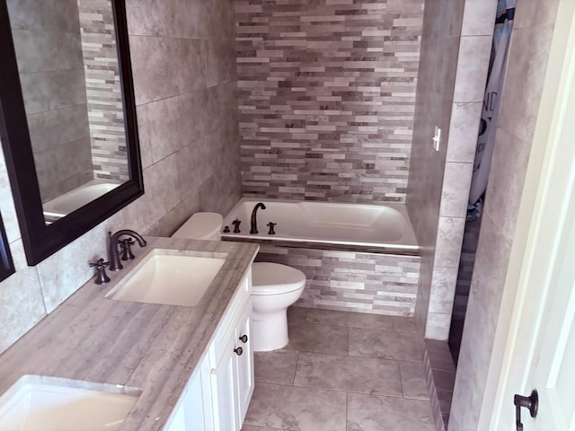 913 N Robertson St, New Orleans, LA 70116 - bathroom featuring toilet, tile walls, tile patterned flooring, and double vanity