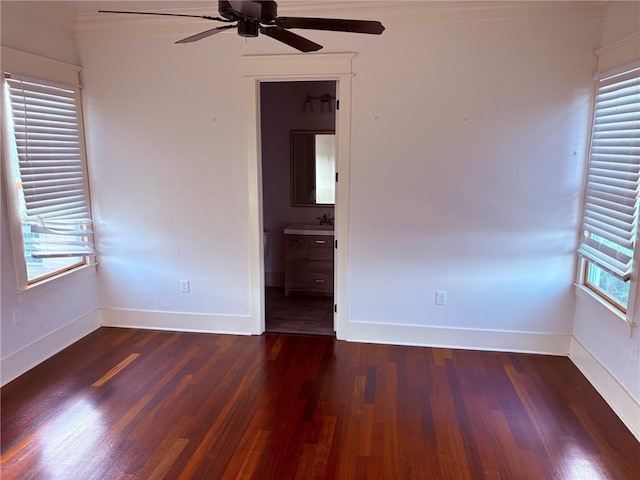 913 N Robertson St, New Orleans, LA 70116 - empty room featuring ceiling fan, wood finished floors, a sink, baseboards, and ornamental molding
