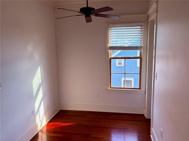 913 N Robertson St, New Orleans, LA 70116 - spare room featuring wood finished floors, ceiling fan, and baseboards